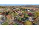 Aerial view of property with surrounding neighborhood and Long Pond Reservoir in the distance at 14582 Homestead Pl, Broomfield, CO 80023
