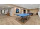 Entertainment basement including a ping pong table and billiards table at 14582 Homestead Pl, Broomfield, CO 80023