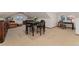 Bonus room with a seating area, table, and desk at 14582 Homestead Pl, Broomfield, CO 80023