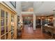 Spacious foyer boasts soaring ceilings, gleaming hardwood floors, and a view into the living area at 14582 Homestead Pl, Broomfield, CO 80023