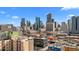 Stunning aerial cityscape capturing Denver's modern architecture and vibrant urban atmosphere under a clear blue sky at 2322 Arapahoe St, Denver, CO 80205