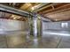 Spacious unfinished basement featuring concrete flooring and exposed utilities for flexible usage and storage at 3224 White Oak St, Highlands Ranch, CO 80129