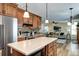 Beautiful kitchen featuring stainless steel appliances, granite countertops, and an island at 3224 White Oak St, Highlands Ranch, CO 80129