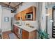 Updated kitchen featuring stainless steel appliances and butcher block countertops at 1745 Wazee St # 3C, Denver, CO 80202