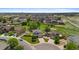 Aerial view showcasing a home nestled in a well-planned community with green spaces at 201 Shenandoah Way, Brighton, CO 80603