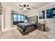 Cozy bedroom features plush carpet and modern decor at 5136 S Ceylon St, Centennial, CO 80015
