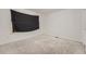A spacious and neutral bedroom has a large window covered by a dark curtain at 5136 S Ceylon St, Centennial, CO 80015