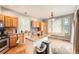 Eat-in kitchen with a kitchen island and great natural light at 5136 S Ceylon St, Centennial, CO 80015