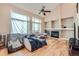 Inviting living room features hardwood floors and a cozy fireplace at 5136 S Ceylon St, Centennial, CO 80015