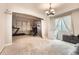 Bright, open living space, perfect for hosting gatherings with decor and modern lighting at 5136 S Ceylon St, Centennial, CO 80015
