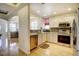 Well-lit kitchen with stainless steel appliances, granite countertops, and hardwood floors at 1727 Pearl St # 205, Denver, CO 80203