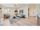 Cozy living room features hardwood floors and neutral decor at 6144 S Fulton St, Englewood, CO 80111