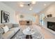 Relaxing living room with fireplace and access to backyard at 6144 S Fulton St, Englewood, CO 80111