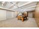 The finished basement provides a pool table and ample space for recreation and entertainment at 396 S Troy St, Aurora, CO 80012
