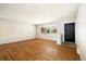 Bright living room featuring gorgeous hardwood floors and plenty of natural light at 396 S Troy St, Aurora, CO 80012