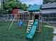 Backyard with playset, including swings and slide at 9581 Green Ct, Westminster, CO 80031