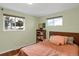 Bright bedroom with double bed and built-in shelving at 9581 Green Ct, Westminster, CO 80031