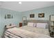 Guest bedroom with a king-size bed and soft lighting at 9581 Green Ct, Westminster, CO 80031