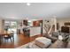 Modern kitchen with stainless steel appliances and breakfast bar at 9581 Green Ct, Westminster, CO 80031