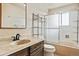 Bathroom with a shower/tub combo and updated vanity at 8566 Flintwood Rd, Parker, CO 80138