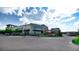 Commercial building hosting Blue Island Oyster Bar & Seafood, with outdoor seating and street view at 10328 Bluffmont Dr, Lone Tree, CO 80124