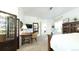 Comfortable main bedroom with a desk and view to the ensuite at 10328 Bluffmont Dr, Lone Tree, CO 80124