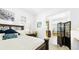 Serene main bedroom with comfortable bedding and ensuite bathroom access at 10328 Bluffmont Dr, Lone Tree, CO 80124