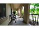 Spacious porch with a series of arches providing shade and architectural interest at 10328 Bluffmont Dr, Lone Tree, CO 80124