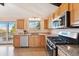 Kitchen with stainless steel appliances and granite countertops at 2780 Juniper Dr, Golden, CO 80401