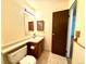 Bathroom featuring updated vanity, toilet, with decorative features at 1870 S Pitkin Cir # B, Aurora, CO 80017
