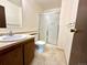 Bathroom with a shower and updated vanity featuring modern fixtures at 1870 S Pitkin Cir # B, Aurora, CO 80017