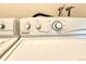 Close-up of the dials on a white washing machine with a variety of options at 1870 S Pitkin Cir # B, Aurora, CO 80017