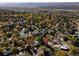 A beautiful aerial view of the property and surrounding neighborhood, highlighting the picturesque landscape and community at 2395 W Davies Ave, Littleton, CO 80120