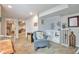 Cozy basement area with a wine rack, providing a comfortable and stylish space at 479 W Jamison Cir, Littleton, CO 80120