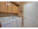 Laundry room with washer and dryer, providing convenience and efficiency at 479 W Jamison Cir, Littleton, CO 80120