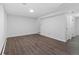 This finished basement offers extra space with modern flooring, great for a Gathering room or recreation area at 9044 E Nassau Ave, Denver, CO 80237