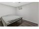 Cozy bedroom features a window for natural light and sleek, modern flooring for a comfortable retreat at 9044 E Nassau Ave, Denver, CO 80237