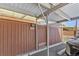 A covered carport provides convenient parking with the unit number visible, adding to its curb appeal at 9044 E Nassau Ave, Denver, CO 80237