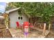 Backyard setup with red table and chairs at 3074 S Elati St, Englewood, CO 80110