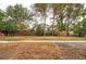 Large backyard with mature trees at 3074 S Elati St, Englewood, CO 80110