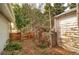 Backyard featuring a shed and some foliage, plus a privacy fence at 3074 S Elati St, Englewood, CO 80110