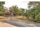 Front yard with a chain-link fence and mailbox at 3074 S Elati St, Englewood, CO 80110