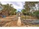 Charming home featuring a spacious front yard with a stone walkway, and a mailbox at 3074 S Elati St, Englewood, CO 80110