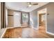 Cozy living room featuring hardwood floors, a large window, and neutral paint at 3074 S Elati St, Englewood, CO 80110