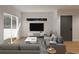 Comfortable living room with sectional sofa, stylish rug, decor, and a sliding glass door creates a welcoming atmosphere at 838 N Cherry St # 1, Denver, CO 80220