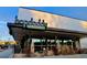Hopdoddy Burger Bar with modern architecture and a stylish outdoor seating area; inviting atmosphere at 838 N Cherry St # 1, Denver, CO 80220