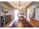 Formal dining room with a large table and hardwood floors at 5952 E Conservation Dr, Frederick, CO 80504