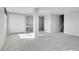 The finished basement is bright and features a large closet and neutral paint and carpeting at 7511 S Sicily Way, Aurora, CO 80016