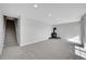 The finished basement includes a wood-burning stove and stairs to the upper level of the home at 7511 S Sicily Way, Aurora, CO 80016
