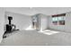 This is a view of a basement with a wood-burning stove and sliding glass doors leading to the outside at 7511 S Sicily Way, Aurora, CO 80016